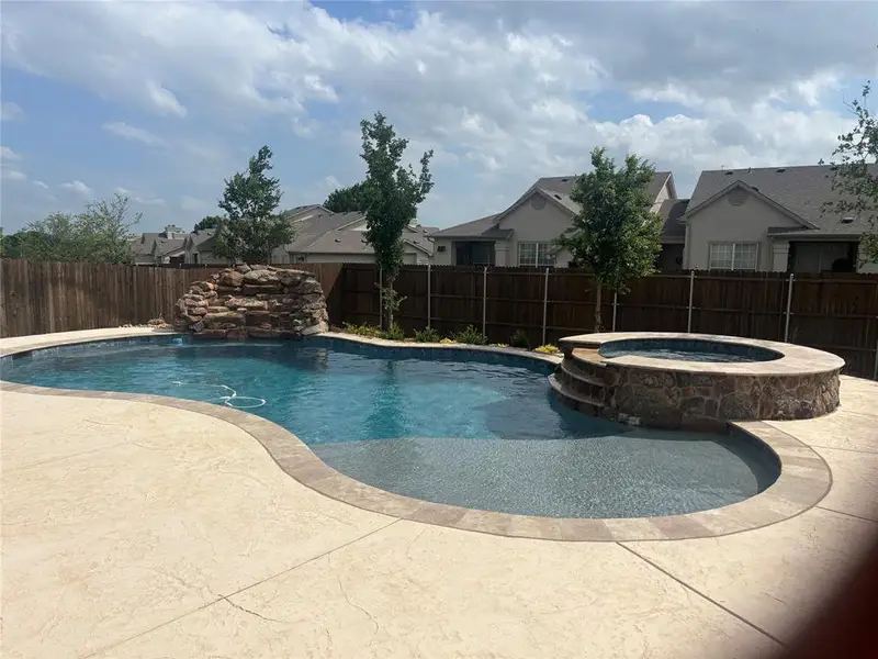 New Pebble pool and hot tub installed