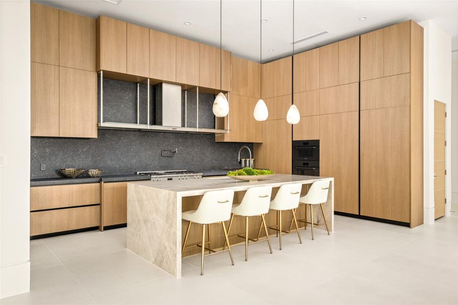 Sophisticated kitchen with clean-lined cabinetry, a statement island, and premium Miele appliance package throughout.