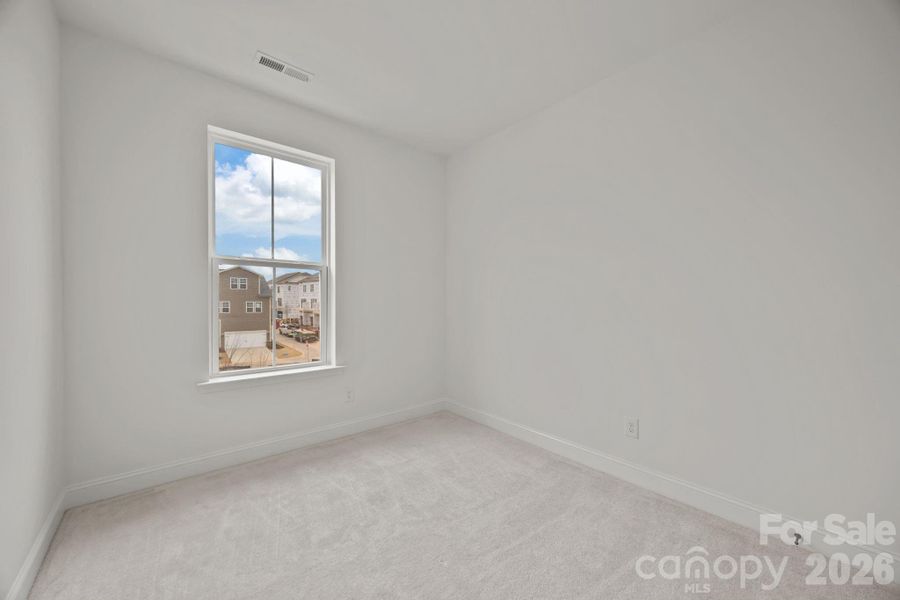 Spacious, unfurnished interior of a new home in River District Townhomes, Charlotte (Image 19).