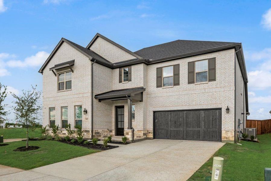 Front exterior of a new home in Sutton Fields, Celina, TX, highlighting curb appeal (Image 20).