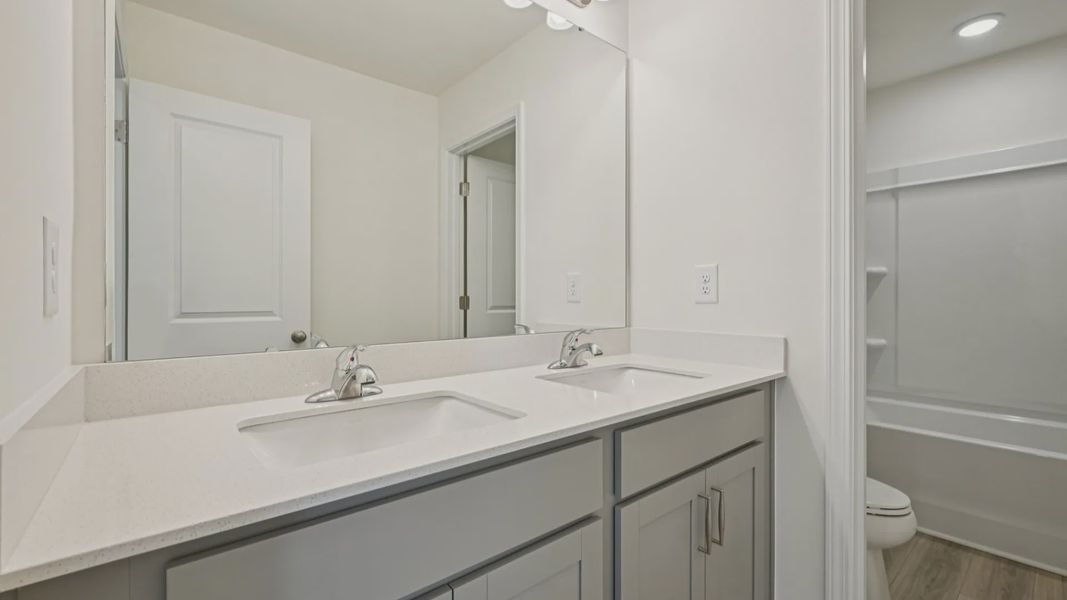 Furnished interior view inside a new home in Station Pointe, Angier (Image 31). Furnished interior view inside a new home in Station Pointe, Angier (Image 31).