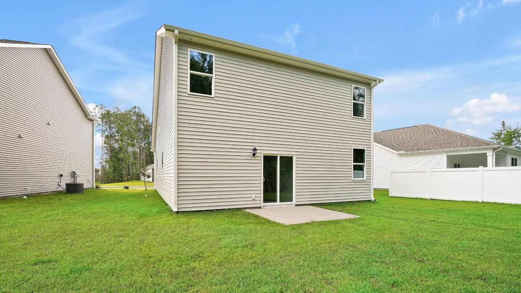 Exterior details and patio area of a home in The Pines at Blake Farm, Wilmington (Image 2).