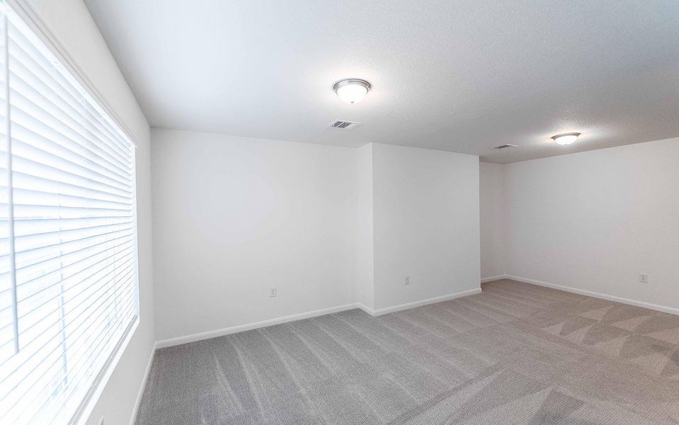 Spacious, unfurnished interior of a new home in Brooklands, Hutto (Image 10).