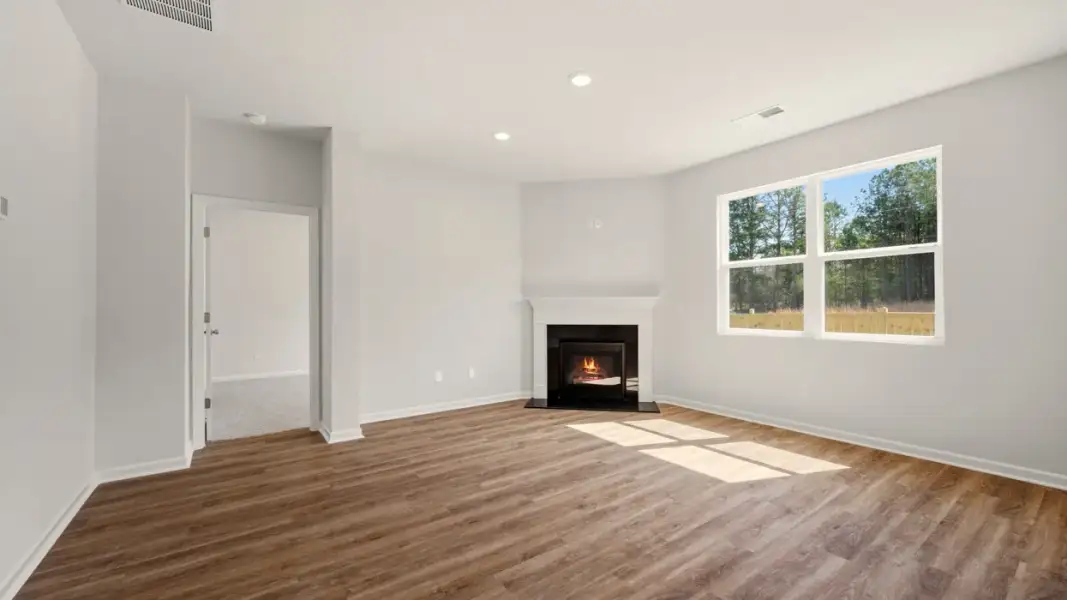 Representative unfurnished interior of a home built from the Cali by D.R. Horton in Branford Crossing, Stockbridge (Image 21).