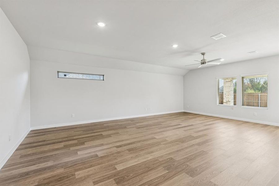 Living and Dining Rooms in the Oscar home plan by Trophy Signature Homes – REPRESENTATIVE PHOTO