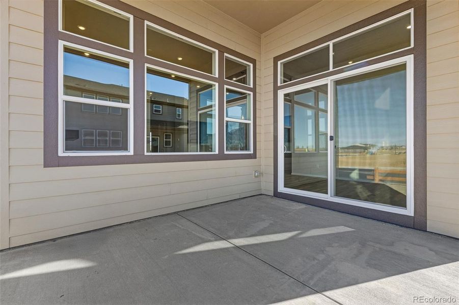 Exterior details and patio area of a home in Talon Pointe, Thornton (Image 3).