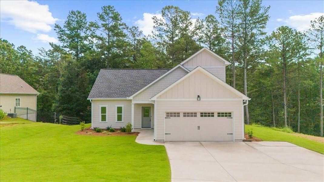 Front exterior of a new home in , Dahlonega, GA, highlighting curb appeal (Image 1). Front exterior of a new home in , Dahlonega, GA, highlighting curb appeal (Image 1).