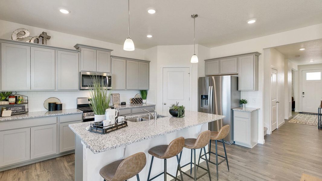 Representative furnished interior of a home built from the Holcombe by D.R. Horton in Settlers Crossing, Commerce City (Image 11).