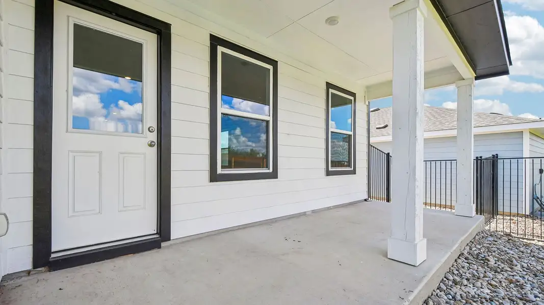 Exterior details and patio area of a home in Trails at Wildhorse, Austin (Image 3).