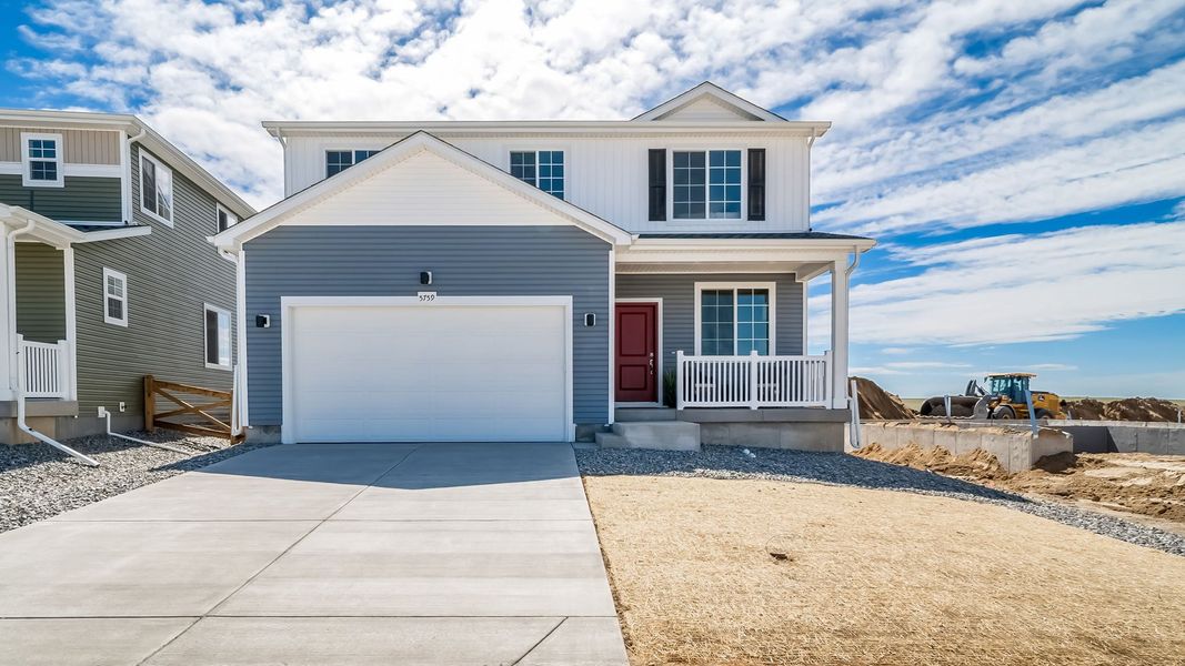 Front exterior of a new home in Banning Lewis Ranch - New Homes Colorado Springs, Colorado Springs, CO, highlighting curb appeal (Image 2). Front exterior of a new home in Banning Lewis Ranch - New Homes Colorado Springs, Colorado Springs, CO, highlighting curb appeal (Image 2).