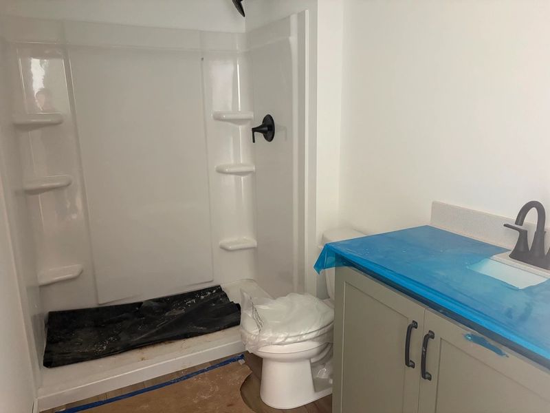 Guest Bath featuring the AW Collection® Rosemary - Garden hues and clean finishes invite calm. Guest Bath featuring the AW Collection® Rosemary - Garden hues and clean finishes invite calm.