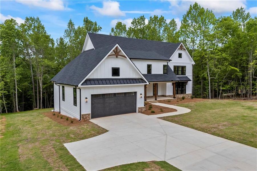 Front exterior of a new home in , Flowery Branch, GA, highlighting curb appeal (Image 28).