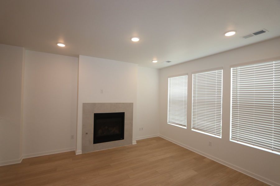 Spacious, unfurnished interior of a new home in Kinston Mainstreet Townhomes, Loveland (Image 5).