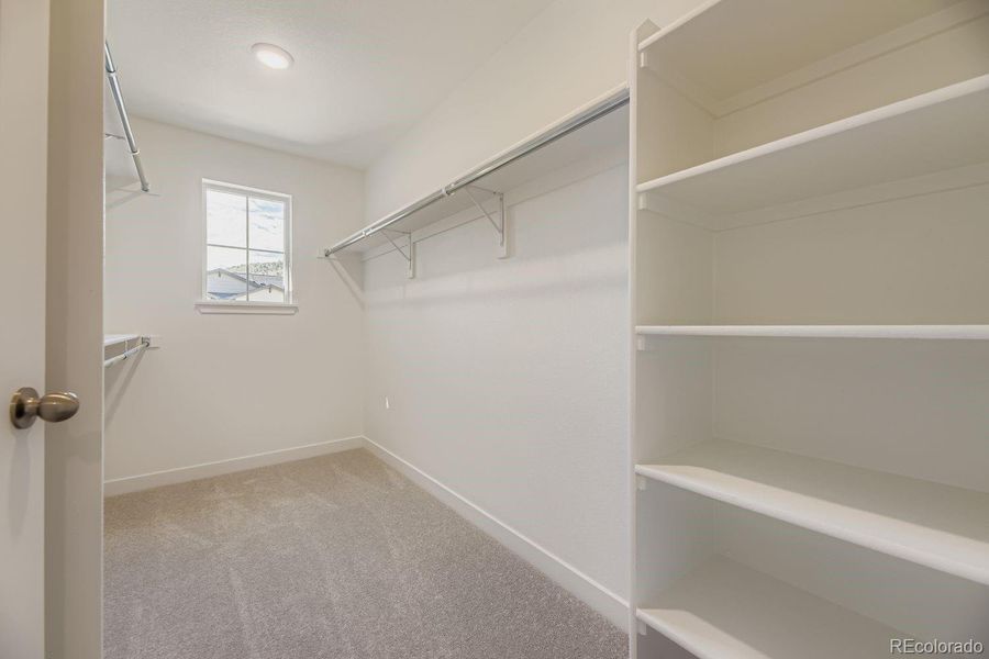 Spacious, unfurnished interior of a new home in Ken-Caryl Ranch: The Monarch Collection, Littleton (Image 11).