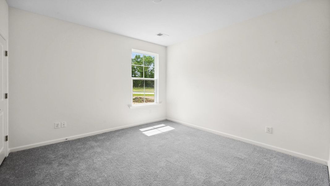 Spacious, unfurnished interior of a new home in Creekside at Andrews, Summerville (Image 18).