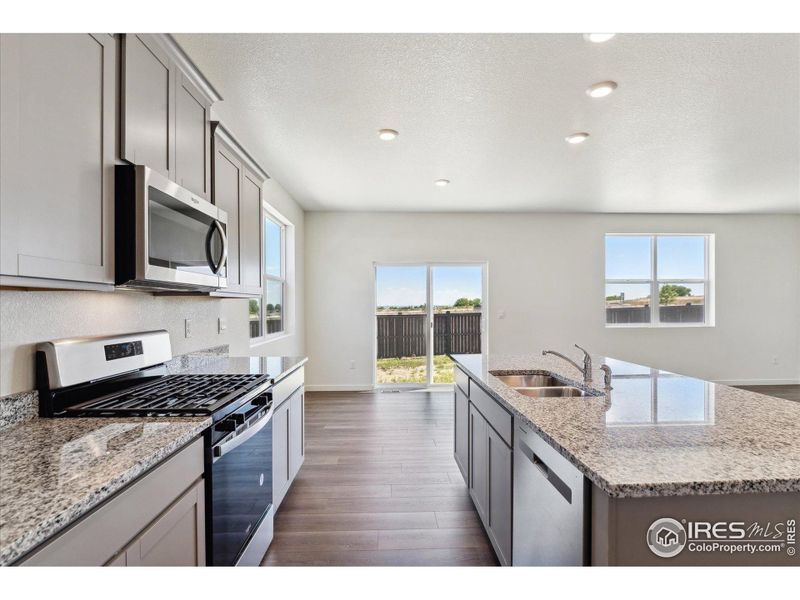Furnished interior view inside a new home in Silver Peaks, Lochbuie (Image 12).