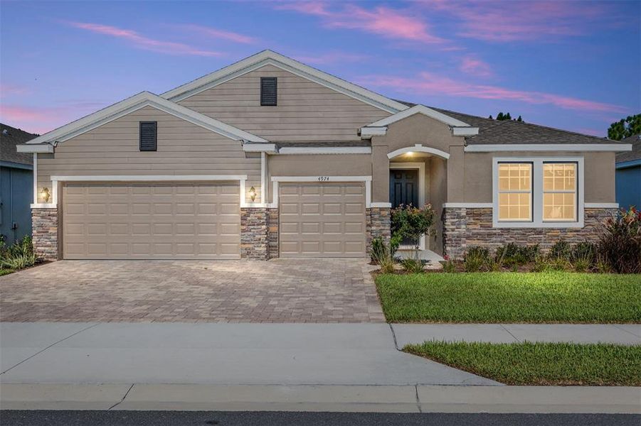 Front exterior of a new home in , Ocala, FL, highlighting curb appeal (Image 2). Front exterior of a new home in , Ocala, FL, highlighting curb appeal (Image 2).