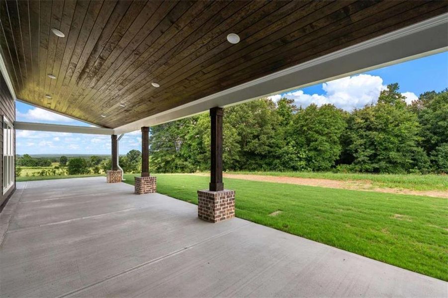 Exterior details and patio area of a home in , Roopville (Image 36).