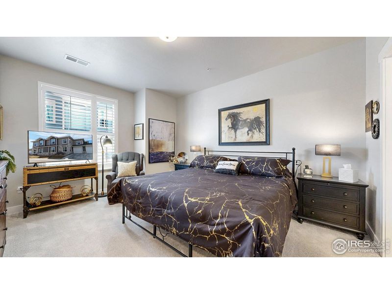 Furnished interior view inside a new home in The Lakes at Centerra - Discovery, Loveland (Image 22).