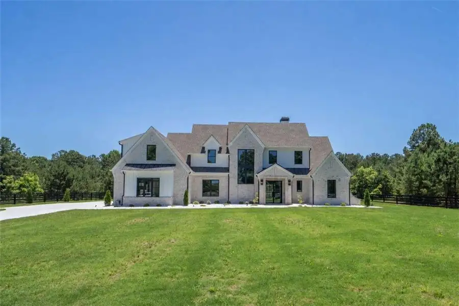 Front exterior of a new home in , Monroe, GA, highlighting curb appeal (Image 29). Front exterior of a new home in , Monroe, GA, highlighting curb appeal (Image 29).