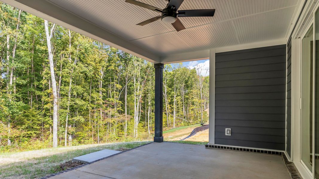 Exterior details and patio area of a home in Brush Creek, Fairview (Image 24).
