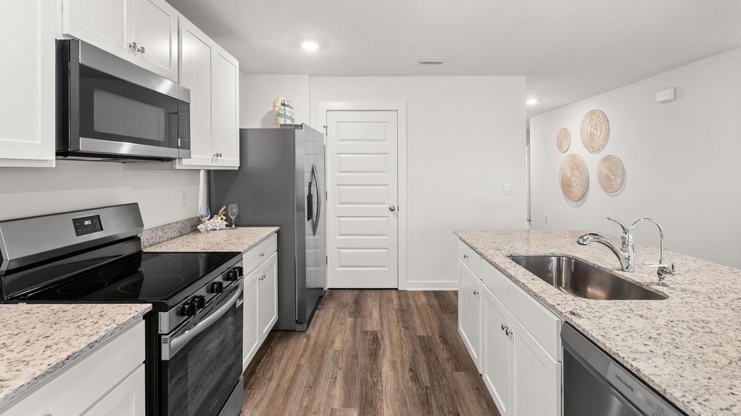 Furnished interior view inside a new home in Magnolia at the Bluffs Phase 3, Freeport (Image 10).