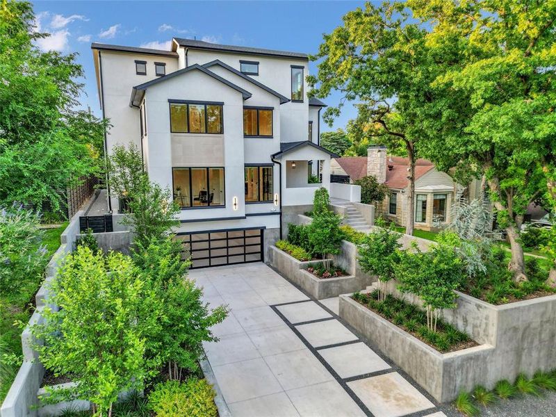 Front exterior of a new home in , Dallas, TX, highlighting curb appeal (Image 21).