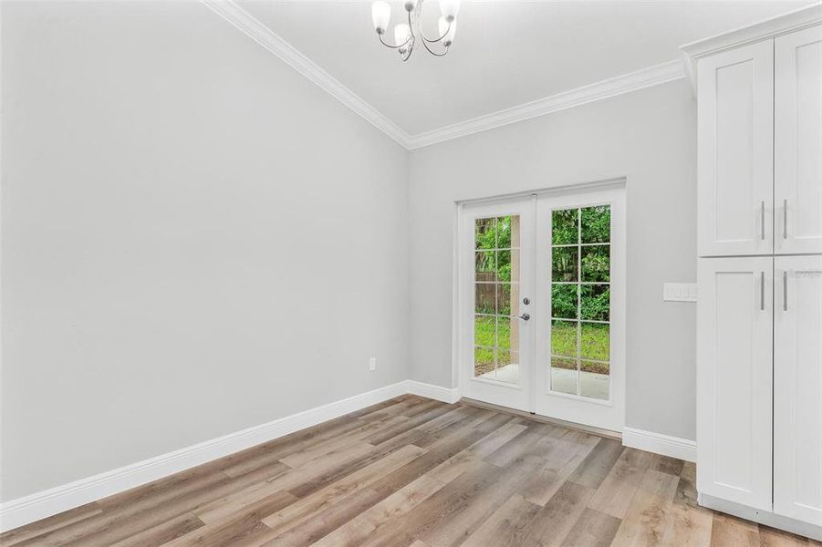 Dining Area with French Doors leading to Patio Area