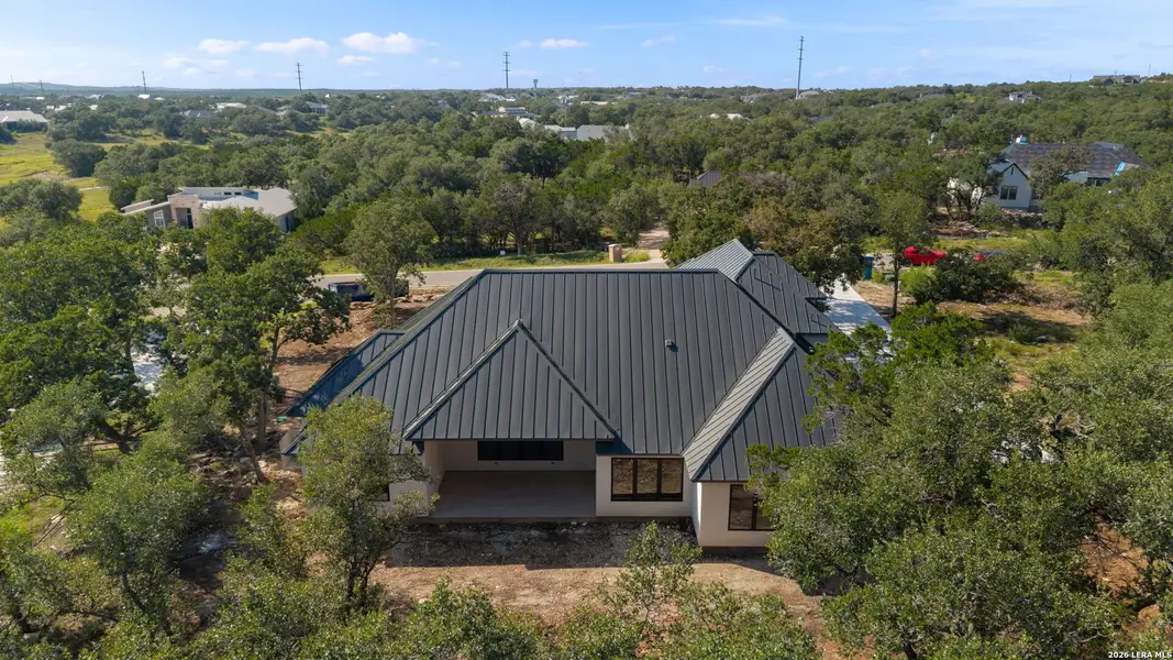 Front exterior of a new home in , Bulverde, TX, highlighting curb appeal (Image 25). Front exterior of a new home in , Bulverde, TX, highlighting curb appeal (Image 25).