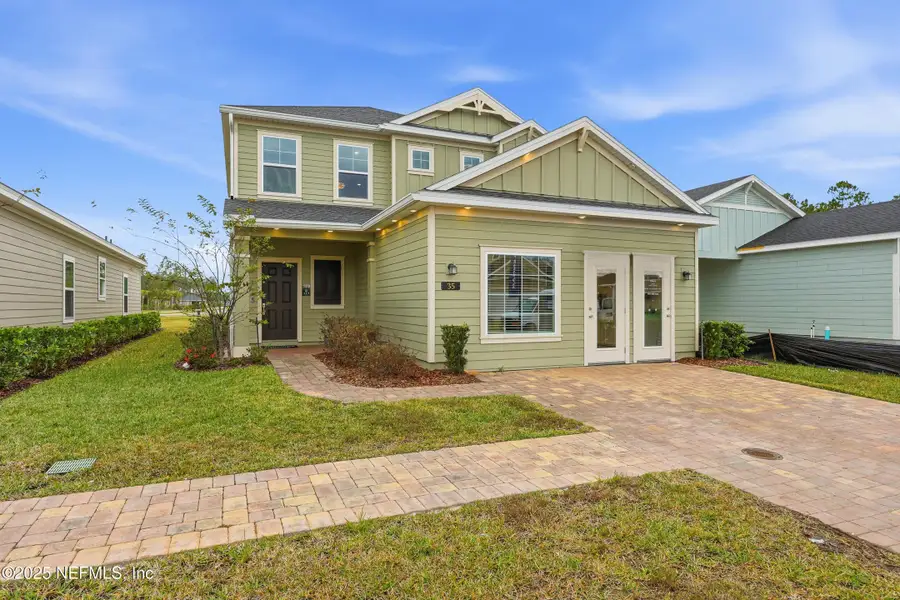 Front exterior of a new home in St Augustine Lakes: St Augustine Lakes 40S, St. Augustine, FL, highlighting curb appeal (Image 2).