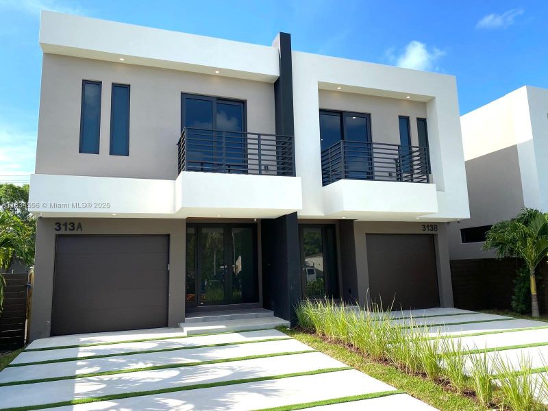 Front exterior of a new home in , Fort Lauderdale, FL, highlighting curb appeal (Image 26). Front exterior of a new home in , Fort Lauderdale, FL, highlighting curb appeal (Image 26).
