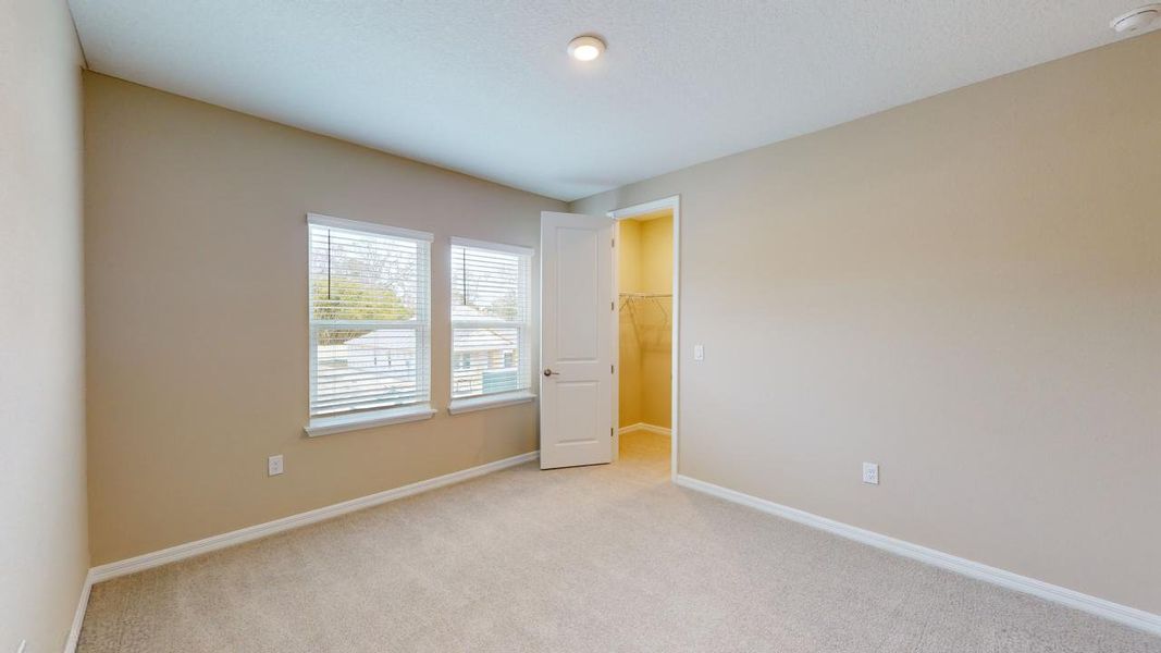 Representative unfurnished interior of a home built from the Barbuda by Taylor Morrison in Headwaters at Lofton Creek, Yulee (Image 44).