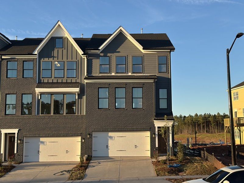 Front exterior of a new home in Sweetbrier, Durham, NC, highlighting curb appeal (Image 1). Front exterior of a new home in Sweetbrier, Durham, NC, highlighting curb appeal (Image 1).