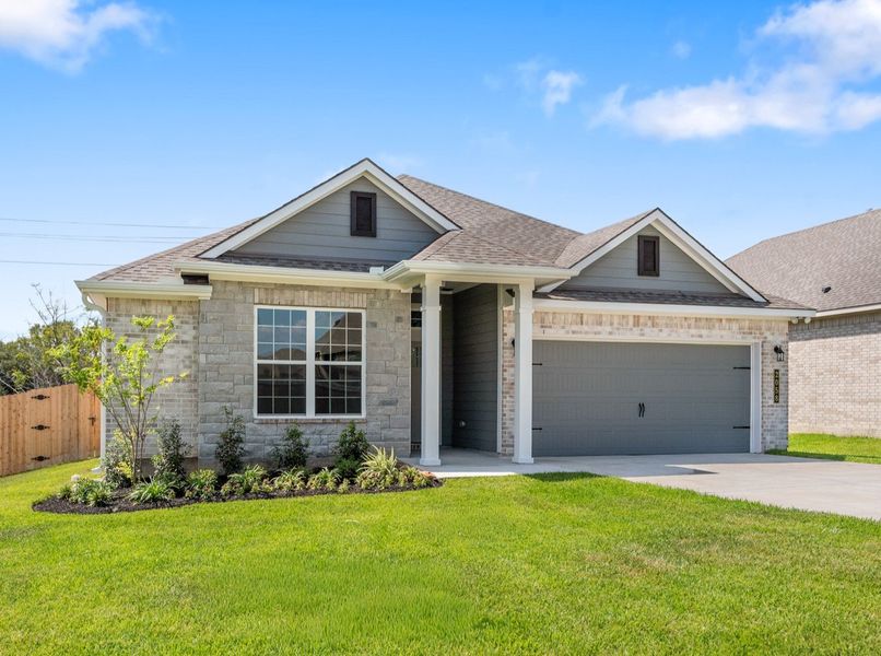 Front exterior of a new home in Highland Oaks, Tyler, TX, highlighting curb appeal (Image 1). Front exterior of a new home in Highland Oaks, Tyler, TX, highlighting curb appeal (Image 1).
