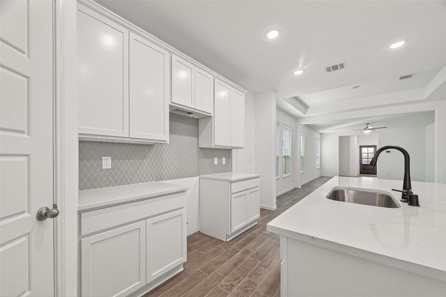 Furnished interior view inside a new home in , Iowa Colony (Image 10).