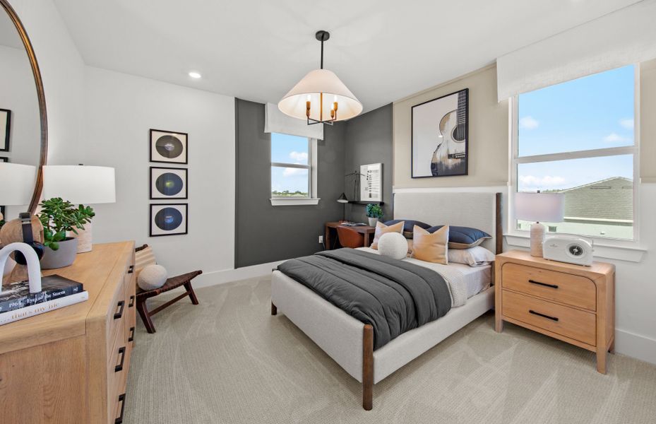 Representative furnished interior of a home built from the Layton Grande by DiVosta in BeachWalk by Manasota Key, Englewood (Image 24).