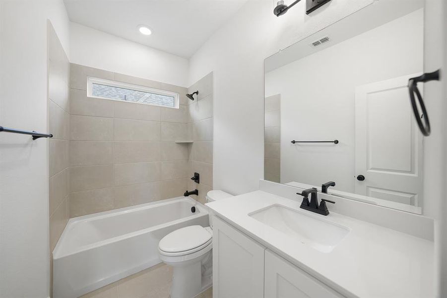 Full bathroom with tub / shower combination and vanity
