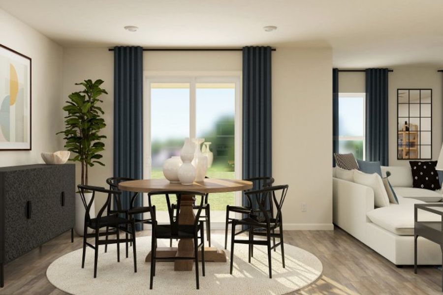 A living room with a table and chairs. A living room with a table and chairs.