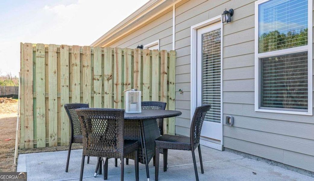 Exterior details and patio area of a home in The Cottages of Silvertown, Thomaston (Image 2). Exterior details and patio area of a home in The Cottages of Silvertown, Thomaston (Image 2).