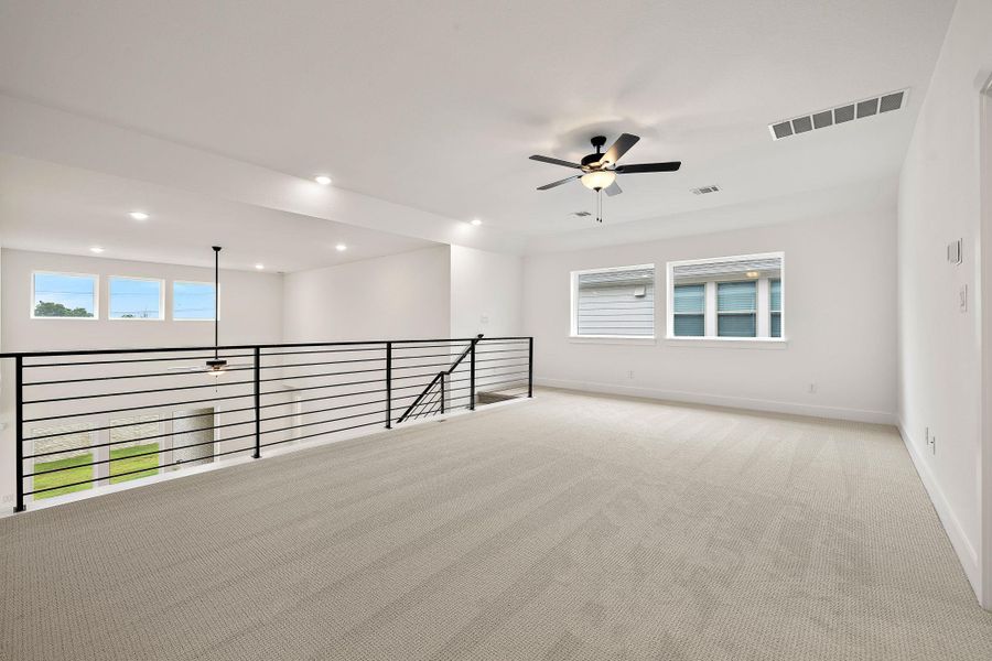 Spacious, unfurnished interior of a new home in Blackhawk in Pflugerville, Pflugerville (Image 26).