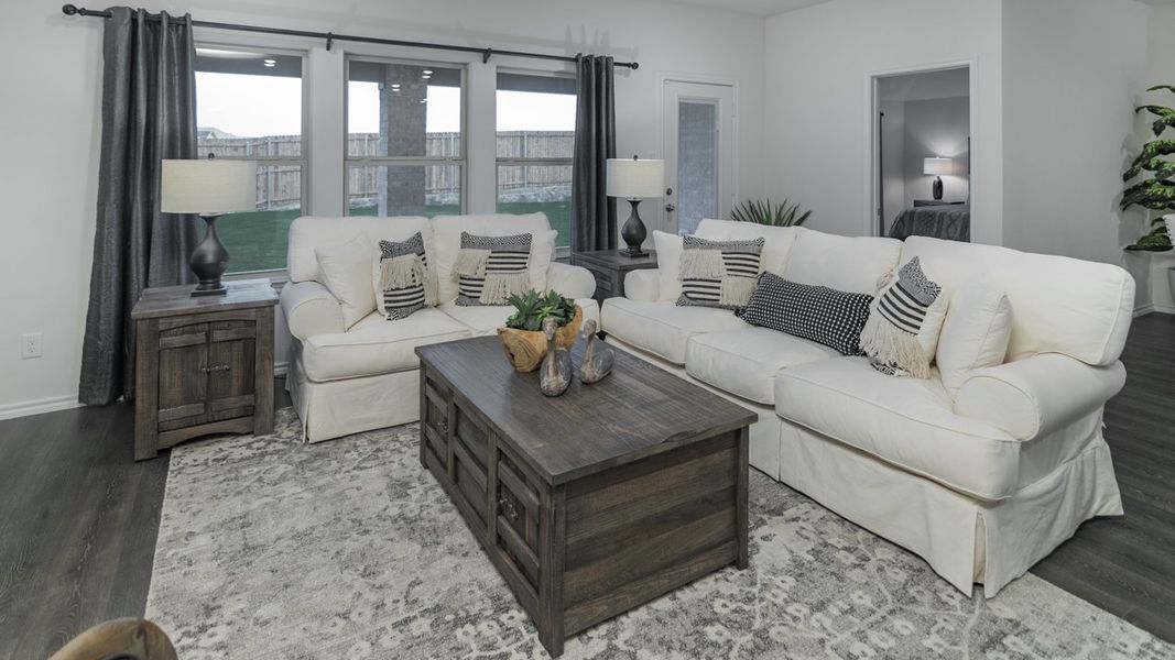 Representative furnished interior of a home built from the X40J Justin by D.R. Horton in Valor Farms, Royse City (Image 11).