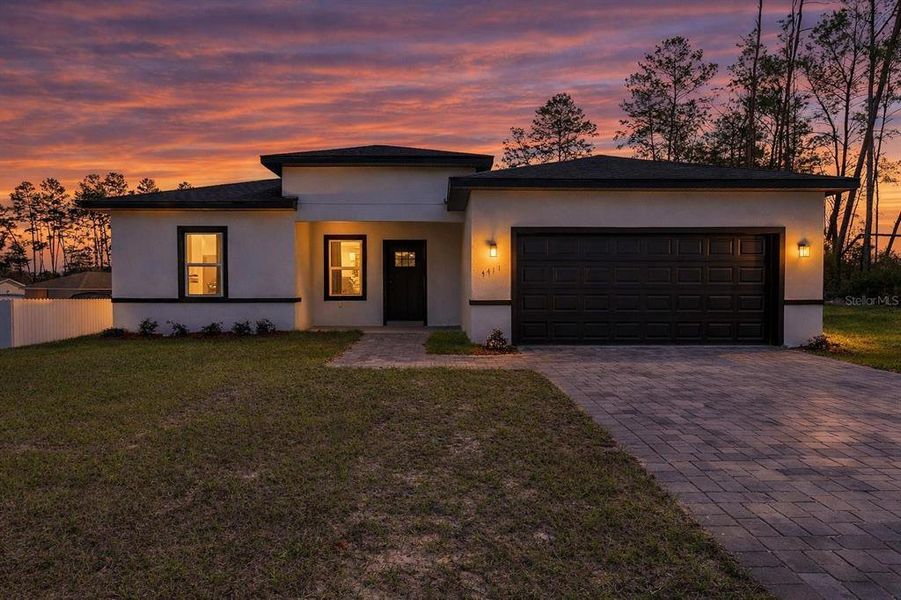 Front exterior of a new home in , Ocala, FL, highlighting curb appeal (Image 27).