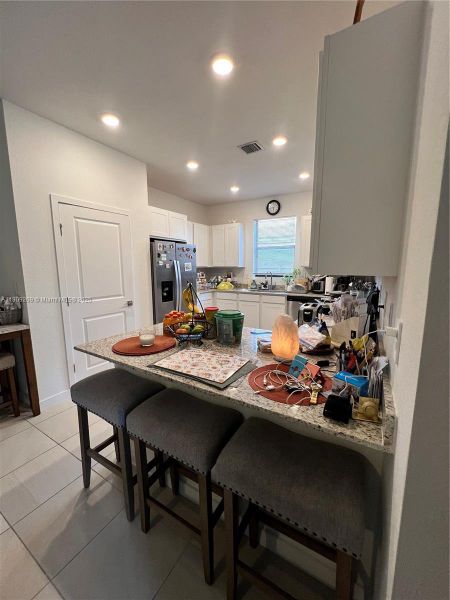 Furnished interior view inside a new home in , Homestead (Image 4). Furnished interior view inside a new home in , Homestead (Image 4).