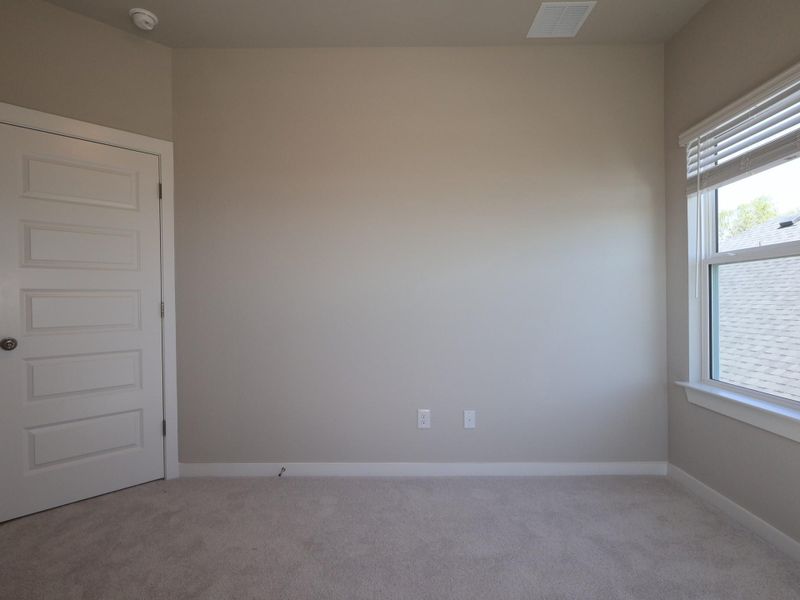 Spacious, unfurnished interior of a new home in Heritage, Dripping Springs (Image 11).