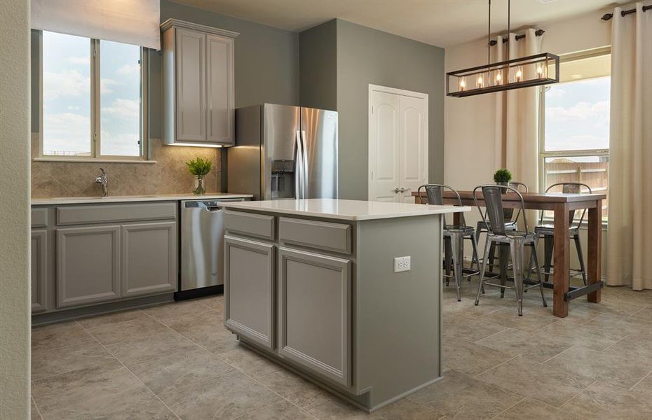 *Model Representation - Large island overlooking gathering room and dining areas *Model Representation - Large island overlooking gathering room and dining areas