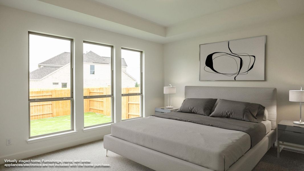 Carpeted bedroom with multiple windows Carpeted bedroom with multiple windows