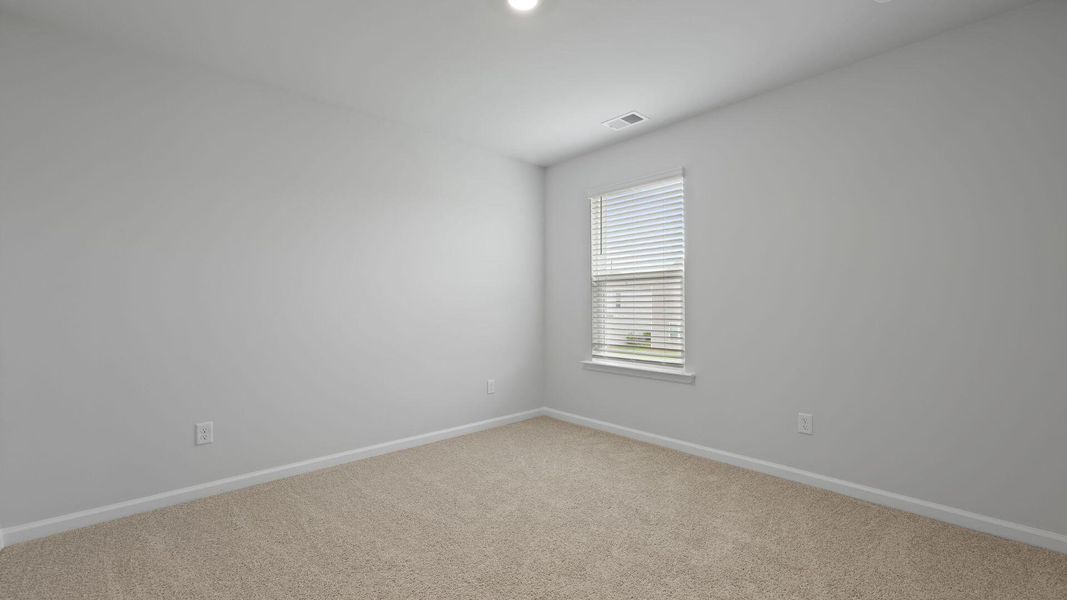 Spacious, unfurnished interior of a new home in Pine Hills at Cane Bay, Summerville (Image 18). Spacious, unfurnished interior of a new home in Pine Hills at Cane Bay, Summerville (Image 18).