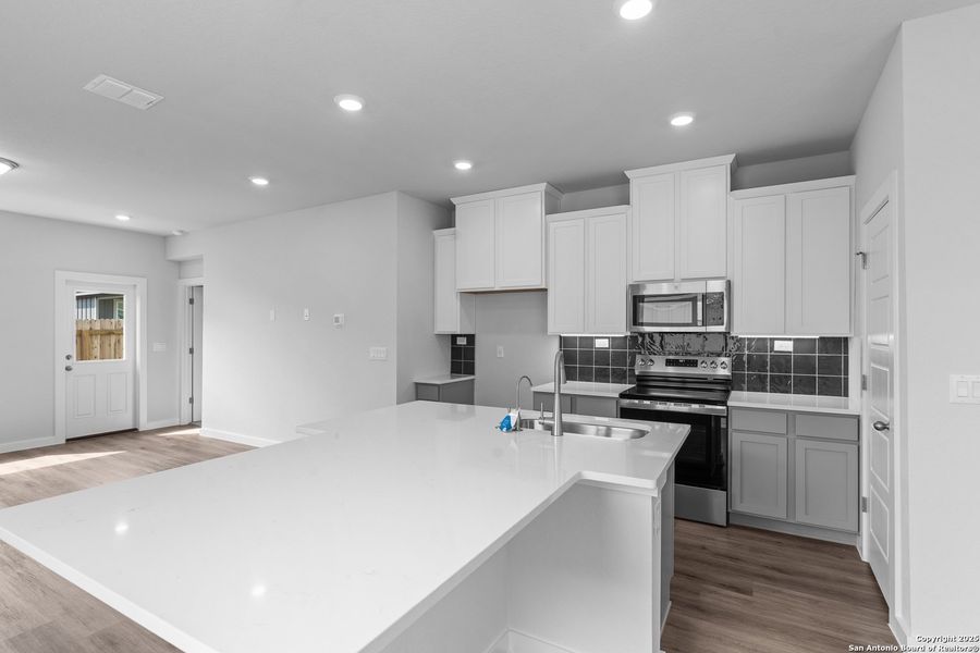 Furnished interior view inside a new home in Highland Ridge, New Braunfels (Image 5). Furnished interior view inside a new home in Highland Ridge, New Braunfels (Image 5).