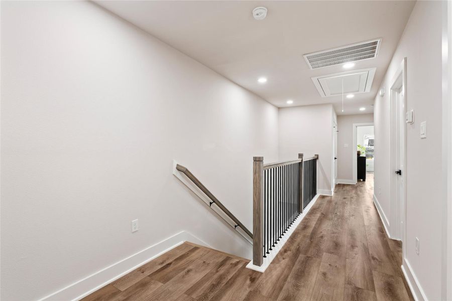 Upstairs feels bright and airy with clean lines, modern finishes, and a layout that offers both privacy and functionality. The open landing provides a natural transition between rooms while keeping the home feeling light and spacious.