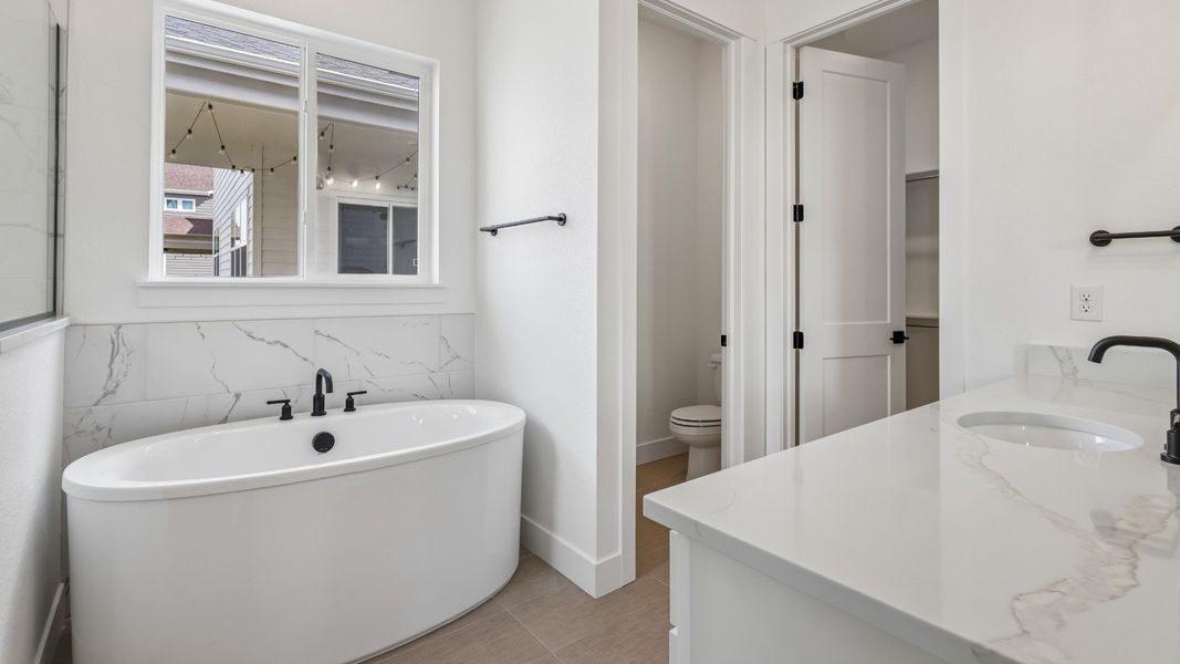 Enjoy comfort and convenience in the owner's bath Enjoy comfort and convenience in the owner's bath